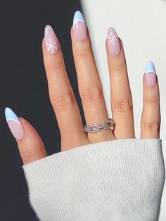 Light Blue French Tips With Snowflakes, Winter French Tip Acrylic Nails, Almond Blue Christmas Nails, Powder Blue Winter Nails, Christmas Nails Snowflake Blue, Simple Snowflake Nails Blue, Light Blue French Tip With Snowflake, Winter Themed Nails Simple, Winter Nails Light Blue And White