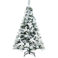 a white christmas tree with snow on it