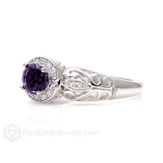 An absolutely gorgeous vintage inspired Amethyst ring ring in your choice of 14K or 18K White, Yellow or Rose Gold. This ring has a .75ct natural Amethyst surrounded by a sparkling diamond halo and diamonds in the leaves of the gorgeous filigree band. It's a beautiful right hand ring or engagement ring. Inquire for the matching wedding band. Amethyst is the birthstone for February. Made to order. Please allow three to four weeks for delivery. ABOUT THIS RING Composition: 14K or 18K Gold Center S Exquisite Amethyst Ring For Anniversary, Elegant Amethyst Birthstone Ring With Prong Setting, Heirloom Amethyst Diamond Promise Ring, Exquisite Amethyst Jewelry With Center Stone, Elegant Amethyst Birthstone Diamond Ring, Elegant Round Amethyst Birthstone Ring, Elegant Amethyst Rings With Accent Stones, Elegant 14k Gold Amethyst Ring For Anniversary, Elegant Amethyst Wedding Ring With Center Stone