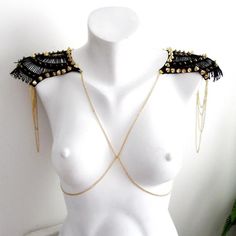 Unique Epaulette black stud leather shoulder chain jewelry  .  Made of  gold colored chains embellishment with gold  accessories sewed on it.Wonderful gift for yourself or for your loved ones . You will get lots of compliments whereever you wear it.Dimensions ;black leather lenght: 18 cm lace width: 15 cm Thanks for checking out my site, and looking at my products. If you have any questions, don’t hesitate to contact me.**** Stored in smoke free area Elegant Handmade Gold Body Jewelry, Black Jewelry With Chain Strap For Festival, Black Chain Strap Jewelry For Festivals, Gold Beaded Body Jewelry For Parties, Elegant Black Body Jewelry For Evening, Black Shoulder Jewelry, Bohemian Style Body Jewelry For Evening, Leather Shoulder Pads, Leather Epaulettes