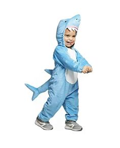 a child in a blue shark costume