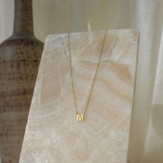 • Material: High-Quality Solid 925 Sterling Silver• Dimension: 7mm letter height• Finish: Sterling Silver ∙ 18K Gold ∙ Rose Gold SKU: MM-NM54F77 Letter Necklace Initials, Name Choker, Letters Necklace, Dainty Initial Necklace, Golden Jewelry, 14k Gold Necklace, Trendy Necklaces, Letter Necklace, Jewelry Pendant