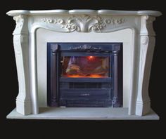 a white fireplace with a black background