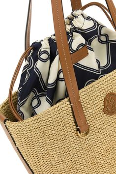 31% cotton, 16% polyester, 53% viscose Designer Woven Straw Bag For Travel, Designer Woven Straw Travel Bag, Designer Travel Straw Bag With Handles, Luxury Beige Straw Bag For Travel, Designer Travel Straw Shoulder Bag, Designer Woven Shoulder Bag For Vacation, Luxury Straw Tote Bag With Rolled Handles, Luxury Straw Bag With Rolled Handles For Daily Use, Luxury Straw Bag For Travel