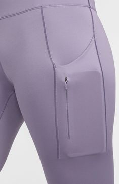 Signature Dri-FIT technology keeps you comfy and dry in second-skin leggings featuring multiple side pockets to keep small essentials secure while on the go. 27" inseam; 11" rise (size Small) Zip pocket Drop-in pockets Dri-FIT moisture-wicking technology 68% nylon, 32% elastane Machine wash, tumble dry Imported Nike Sporty Activewear With Side Pockets, Nike Compression Activewear With Moisture-wicking, Nike Compression Moisture-wicking Activewear, Nike Functional Compression Activewear, Functional Nike Compression Activewear, Functional Compressive Activewear With Hip Pockets, Nike Stretch Yoga Pants, Nike Compressive Functional Bottoms, Nike Activewear With Pockets