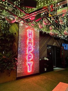 an indoor area with lights and decorations on the ceiling, along with a large sign that reads'boogy '