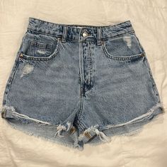 Women’s Denim Shorts From H&M Size: 2 Color: Washed Blue Denim; Distressed Brand: H&M Button Fly. 5 Pockets. Short, Raw Edge. High-Waisted. Never Worn. H&m High Waist Denim Blue Jeans, Trendy H&m Bottoms For Day Out, H&m Denim Blue Bottoms With Pockets, H&m Denim Blue Straight Leg Bottoms, H&m High Waist Dark Wash Bottoms, H&m Straight Leg Denim Blue Bottoms, H&m High Waist Denim Jeans, H&m High Waist Jeans For Spring, H&m High Waist Spring Jeans