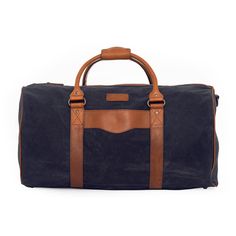 Campaign Waxed Canvas Medium Field Duffle Bag-Bags > Duffle Bag > Waxed Canvas-Hickory-Navy-Mission Mercantile Leather Goods Classic Rectangular Travel Bag With Waxed Finish, Classic Rectangular Waxed Canvas Travel Bag, Classic Waxed Canvas Bag With Leather Backing, Classic Waxed Canvas Weekender Bag For Everyday Use, Classic Waxed Weekender Bag For Trips, Classic Waxed Weekender Bag For Weekend Trips, Classic Waxed Finish Weekender Bag For Weekend Trips, Classic Duffle Bag With Leather Trim For Everyday Use, Classic Everyday Travel Bag With Waxed Finish