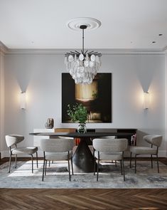 a dining room table with chairs and a chandelier hanging from it's ceiling