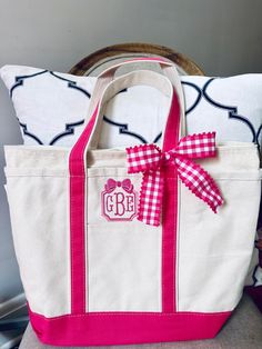 "This monogrammed canvas tote is the perfect bag to carry all your belonging while still showcasing your signature style!  Add a monogram or name so it never goes missing. The bag's roomy interior is perfect for trips to the beach or boating, parks, picnics or farmer's market. It is also a stylish alternative to a typical diaper bag or a chic holder for your pet's toys. This versatility of the bag makes it an ideal teacher gift, bridesmaid gift, baby present, or birthday present for a child or a Monogram Beach Bag, Custom Beach Bags, Dark Red Brown, Boat Tote, Tote Bag Custom, Medium Tote Bag, Baby Presents, Pet Bag, Personalized Canvas