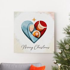 a christmas card hanging on the wall above a couch