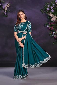 Saree Fabric : Crepe Satin Silk Blouse Fabric: Malai Satin Color : Sea Green Work: Cord, Sequence & Thread with Stone & Moti Work Product contains : 1 Saree, 1 Blouse Wash Care: Dry Clean Only Saree Length: 5.5 metres Blouse Length: 0.8 metre blouse (Unstitched) Floor-length Cutdana Blouse For Diwali, Chinon Saree Blouse For Eid, Fitted Art Silk Pre-draped Saree With Resham Embroidery, Art Silk Pre-draped Saree With Dori Work, Eid Pre-draped Art Silk Saree With Resham Embroidery, Chinon Blouse Piece For Eid, Art Silk Saree For Reception During Navratri, Fitted Chinon Blouse Piece For Saree, Art Silk Anarkali Pre-draped Saree