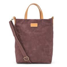 The slimline style of this crossbody bag is smart and casual. The adjustable crossbody strap keeps your hands free or remove the strap and carry by its two leather handles for a chic handbag look. Washable Paper, Chic Handbags, Leather Handles, Shoulder Tote, Vegetable Tanned Leather, Crossbody Strap, Michael Kors Monogram, Leather Handle, Hands Free