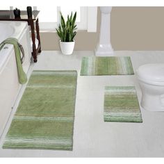 bathroom rugs with green and white stripes on them