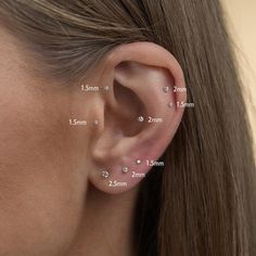 a woman's ear is shown with three different sizes and measurements for the ears