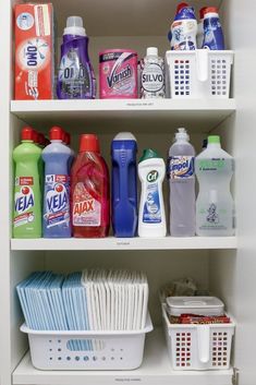 the shelves are filled with cleaning products and detergents