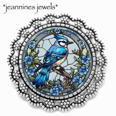 Jeannine’s Jewels Art Print Jewelry is custom handcrafted in my home studio and shipped via USPS from Vermont USA Art Print Brooches are set in a .925 Antique sterling silver plated over pewter (nickel free) Bezel with a pin securely soldered to the back The beautiful piece measures 1.3 inches (a little larger than a US Quarter) The 1 inch circular artwork is printed using archival inks and high quality HP papers and protected with crystal clear professional jewelers resin which beautifully enha Circular Artwork, Stained Glass Blue, Bird Watcher Gifts, Vermont Usa, Silver Brooch Pin, Floral Art Print, Bird Watcher, Usa Art, Faux Stained Glass