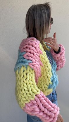 Pink Knit Acrylic Cardigan, Yellow Knitted Winter Cardigan, Multicolor Knitted Acrylic Sweater Coat, Winter Multicolor Chunky Knit Cardigan, Multicolor Chunky Knit Cardigan For Winter, Multicolor Knitted Acrylic Outerwear, Multicolor Cozy Acrylic Cardigan, Cozy Multicolor Acrylic Cardigan, Colorful Knitted Winter Cardigan