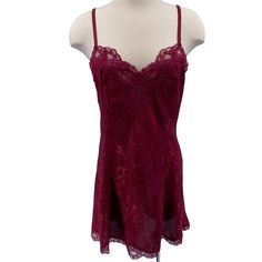 Features: * Vintage slip dress/chemise * Tags have been removed, but I believe it's approximately a medium * Maroon with floral jaquard print * Lace trim * Adjustable straps * Chemise * Floral * Made in Unknown * Machine wash * Gently used condition Size: Womens M Measurements: Across Bust: 17 in / 43 cm Across Waist: 15.5 in / 39 cm Across Hips: 18.5 in / 47 cm Length: does not include strap length 29.5 in / 75 cm Condition: Pre-Owned Good Tags have been removed. I would say it's approximately a medium Fitted Lace V-neck Chemise, Lace Chemise With Spaghetti Straps For Night, Night Lace Chemise With Spaghetti Straps, Sleeveless Lace Chemise With Built-in Bra, Sleeveless Lace Slip Dress With Built-in Bra, Lace Slip Dress With Built-in Bra, Sleeveless Lace Chemise For Party, Lace Camisole Slip Dress For Night, Lace Cami Slip Dress For Night