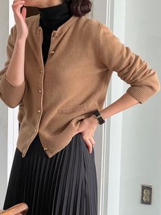 Long sleeve round neck button through cardigan in wool cashmere blend. Soap button details. Model is in MINUSEY ONE SIZE. ✔️ Free worldwide express shipping over $100✔️ Loved by 6,500+ customers✔️ Limited edition collections, maximum style⠀⠀⠀⠀⠀⠀⠀⠀⠀Stay ahead of the trend with can’t-find-anywhere-else staples. Your closet will thank you 💕* MINUSEY ONE SIZE = EU 34-38, US 2-6* 75% Merino Wool / 10% Cashmere / 15% Nylon* Dry clean* Made in Korea - Model Height: 172cm/5'7" (US2, EU34) Winter Business Casual Cardigan With Button Closure, Solid Button Sweater For Work, Cashmere Cardigan With Buttons For Work, Fall Business Casual Sweater With Buttons, Business Casual Buttoned Sweater For Fall, Business Casual Sweater With Button Closure For Winter, Elegant Business Casual Sweater With Button Closure, Chic Crew Neck Cardigan With Buttons, Solid Color Sweater With Button Closure For Work