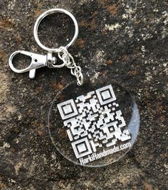 a keychain with a qr code printed on it