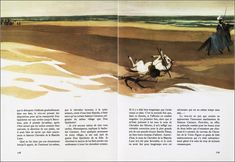 an open book with pictures of horses running on the beach