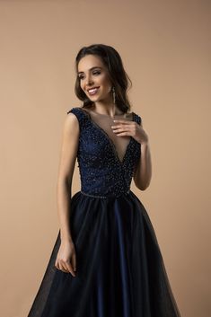 Discover the epitome of evening sophistication with our Regal Navy Sequin-Embroidered A-Line Gown. This dress combines luxurious detailing with an aura of timeless grace. The bodice, adorned with intricate sequin embroidery, creates a mesmerizing pattern that sparkles with every movement. Crafted to flatter, the plunging V-neckline adds a touch of allure, while the sheer overlay introduces a dreamy and romantic silhouette. Embracing a plus-size fit, this gown ensures comfort without compromising Victorian Style Wedding Dress, Antique Wedding Dresses, Victorian Style Wedding, Antoinette Dress, Nontraditional Wedding Dress, Gothic Wedding Dress, V Neck Prom Dresses, Sequin Embroidery, Queen Dress