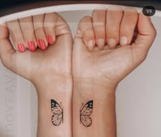 two wrist tattoos with butterflies on them, one is black and the other is white