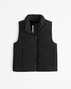 Cozy lightweight puffer vest in a wind- and water-resistant fabric, featuring quilting details, recycled fill, polar fleece-lined mockneck collar, zip-up front and cozy-lined zip pockets. Girls Puffer Vest, Kids Coats Girls, Girls Coats, Abercrombie Kids, Girl Coat, Water Resistant Fabric, Polar Fleece, Puffer Vest, Zip Up