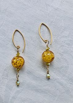 Amber Venetian Glass and Swarovski Crystals Earrings-SugarJewlz Handmade Jewelry Gold Beaded Dangle Earrings With French Hook, Gold Jewelry With French Hook And Round Beads, Elegant Gold Beaded Earrings With Czech Glass, Elegant Gold Beaded Earrings With Lever Back, Wire Wrapped Glass Bead Earrings, Gold Crystal Earrings With Round Beads On Ear Wire, Gold Beaded Earrings With Czech Glass, Gold Crystal Earrings With Round Beads, Gold Czech Glass Earrings With Round Beads