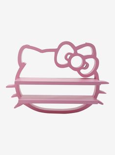 a pink hello kitty shelf is shown against a white background