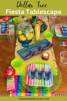 the table is set with colorful plates and napkins