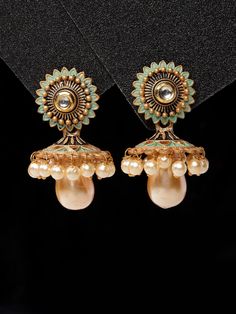 Gold-Plated Floral Jhumkas Earrings Earrings/Indian Jewelry/Pakistani Jewelry/Bollywood Pearl Jewelry/CZ Ethnic Earrings/Statement Earrings Main Stone: Kundan Style : Drop Earring Color : Golden Metal: Alloy Closure: Post and Back Size & Fit: Length of Earring: 4.5 CM Material & Care: Alloy and Artificial beads Care Instructions: Wipe your jewellery with a soft cloth after every use Always store your jewellery in a flat box to avoid accidental scratches Keep sprays and perfumes away from your je Temple Jewelry Kundan Jhumkas For Pierced Ears, Traditional Festive Danglers For Pierced Ears, Bollywood Festive Earrings For Pierced Ears, Festive Kundan Danglers, Festive Chandbali Danglers For Pierced Ears, Festive Meenakari Drop Pearl Earrings, Bollywood Meenakari Earrings For Eid, Bollywood Style Kundan Jhumkas, Bollywood Style Meenakari Earrings For Eid