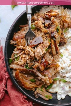 shredded pork and rice in a skillet with a fork on the side text reads slow cooker pulled pork