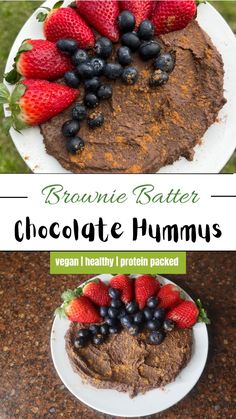 chocolate hummus with strawberries and blueberries in the middle on a white plate