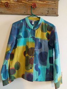 Fantastic and fun vintage jacket made in Ecuador.  Measurements Chest: 19 inches Sleeves: 22 inches Shoulder to hem: 29 inches Funky Long Sleeve Winter Outerwear, Retro Button-up Patchwork Outerwear, Funky Multicolor Fall Outerwear, Vintage Green Relaxed Fit Outerwear, Green Vintage Outerwear With Relaxed Fit, Retro Multicolor Collared Outerwear, Funky Long Sleeve Outerwear For Fall, Cotton Jackets Women, Winter Sun