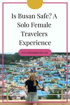 A woman standing in front of colorful buildings in Busan, South Korea with the text "Is Busan Safe? A Solo Female Travelers Experience". Learn Basic Korean, Korean Phrases, Tourist Information