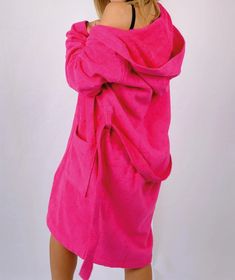 Step into comfort and vibrant style with our Fuchsia Bathrobe, crafted from 100% high-quality cotton. Perfect for relaxing at home, this bathrobe offers both functionality and a pop of color to your loungewear collection. Key Features: Premium Material: Made from 100% pure cotton, ensuring exceptional softness, breathability, and durability. Vibrant Design: The bold fuchsia color adds a lively and cheerful touch to your daily routine. Versatile Fit: Available in four sizes - S, M, L, and XL, designed to provide a comfortable and flattering fit for all body types. Easy Care: Machine washable for hassle-free maintenance and long-lasting use. Wrap yourself in the luxurious feel of this striking bathrobe and elevate your everyday relaxation. Perfect as a gift or a personal indulgence, this bat Cozy Cotton Robe For Loungewear, Casual Oversized Robe For Loungewear, Casual Robe For Relaxation, Casual Cotton Lounging Robe, Casual Cotton Robe For Lounging, Casual Robe With Relaxed Fit For Loungewear, Casual Relaxed Fit Robe For Loungewear, Cotton Beachwear Robe For Loungewear, Cotton Robe For Beachwear And Loungewear