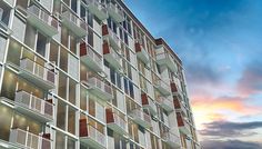 an apartment building with multiple balconies and windows