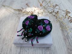 An exclusive gift for your loved one - Perfect gift for Women,teacher or doctor appreciation  ----HAND CRAFTED,HAND STITCHED-ONLY ONE KIND NEVER BE REPEATED---     this Emerald cicada brooch  will be well combined with an evening dress, a winter coat, business suit, warm sweater or as shawl brooch, making a final note in your unique style. Looks very naturalistic and elegant The insect pin is made of high-quality materials: Swarovski crystals, Japanese beads, Czech crystal beads. The central ele Elegant Brooches With Appliques As Gifts, Handmade Elegant Brooches For Gifts, Handmade Multicolor Brooches For Wedding, Unique Green Brooch For Gift, Unique Green Brooches As Gifts, Unique Green Brooches For Gifts, Multicolor Handmade Flowers Brooches As Gift, Multicolor Handmade Wedding Brooches, Handmade Purple Brooches For Gifts