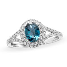 an oval blue and white diamond ring