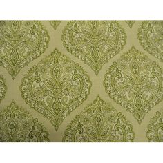 a green and white wallpaper with an ornate design