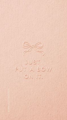 the words just put a bow on it are written in cursive writing with a ribbon