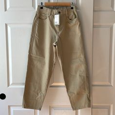 Nwt Tan Colored High Rise Pants From H&M. Ankle Length. Elastic Waist Band With Zipper And Button Closure. 100% Cotton. Size 8. Approximate Measurements: Waist - 13 Inches Rise - 12 Inches Length - 36 Inches Casual High-waisted Khaki Chinos, Casual Khaki High-waisted Chinos, Khaki Cropped Leg Pants With Pockets, Casual Cropped Leg Chinos For Spring, Casual Beige Cropped Leg Jeans, Casual Spring Cropped Leg Chinos, H&m Relaxed Fit Bottoms For Fall, H&m Relaxed Fit Fall Bottoms, H&m Wide Leg Pants For Fall