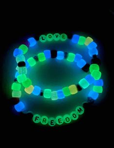 glow bracelets with love written on them