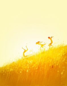 three people jumping in the air on top of a grass covered hill with sun shining behind them