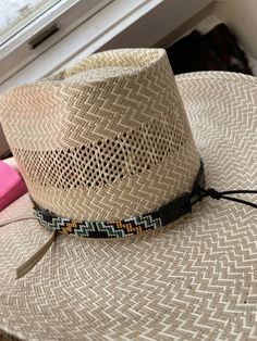 "5/8\" Wide Aztec Green and Gold Hat Band. All beadwork is beaded with 10lb extreme braided nylon line. All hat bands are finished at 23\" with glued than sewed down leather ends and an adjustable leather tie." Adjustable Braided Country Straw Hat, Adjustable Braided Straw Hat In Country Style, Rodeo Hats With Braided Short Brim, Rodeo Braided Hat With Short Brim, Braided Short Brim Hat For Rodeo, Adjustable Braided Western Panama Hat, Traditional Adjustable Hat For Outdoor, Western Brown Woven Hat, Brown Woven Western Hats