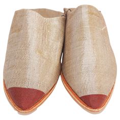 Moroccan Silk Slippers Babouches, chic and soft. These Moroccan silk slippers are handmade to perfection the inside sole is crafted of soft leather, hand-sewn leather sole. You won't want to take the Moroccan babouches off your feet! Moroccan slippers to wear around the pool or at home just in time for summer, perfect for both indoor and outdoor wear. Moroccan traditional babouches, pointed flat mules in silk handwoven in silver and red colors, slip-on style, pointed toe, flat sole. Measurements Summer Pointed Toe Slippers With Leather Sole, Beige Slippers With Leather Sole And Flat Heel, Beige Slippers With Leather Sole, Artisan Closed Toe Mules With Leather Sole, Traditional Natural Closed Toe Mules, Silk Slippers, Moroccan Shoes, Moroccan Slippers, Hand Sewn Leather