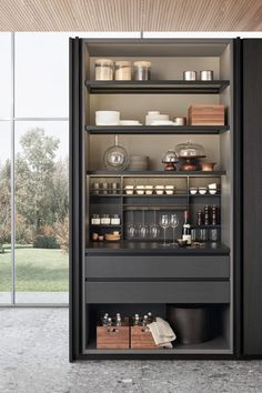 an open cabinet with many items in it