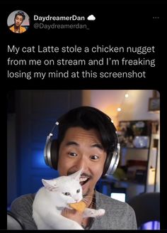 a man wearing headphones holding a white cat in front of his face with the caption, my cat late sole a chicken nugget from me on stream and i'm'm freaking losing my mind at this screenshot